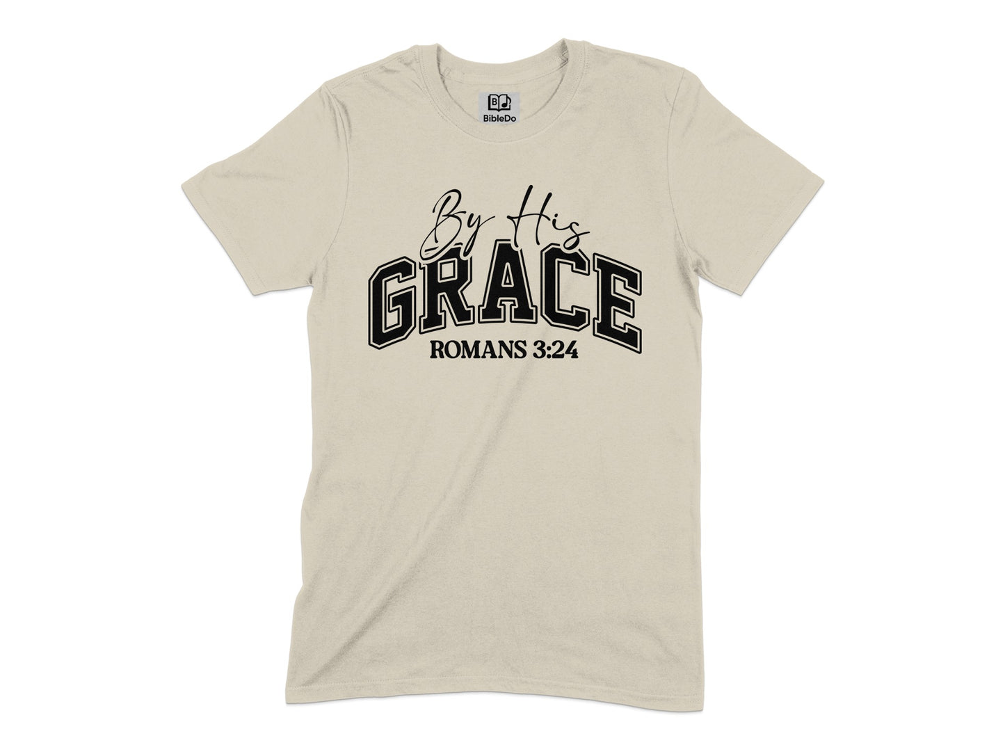 By His Grace Romans 3:24 Graphic Tee product