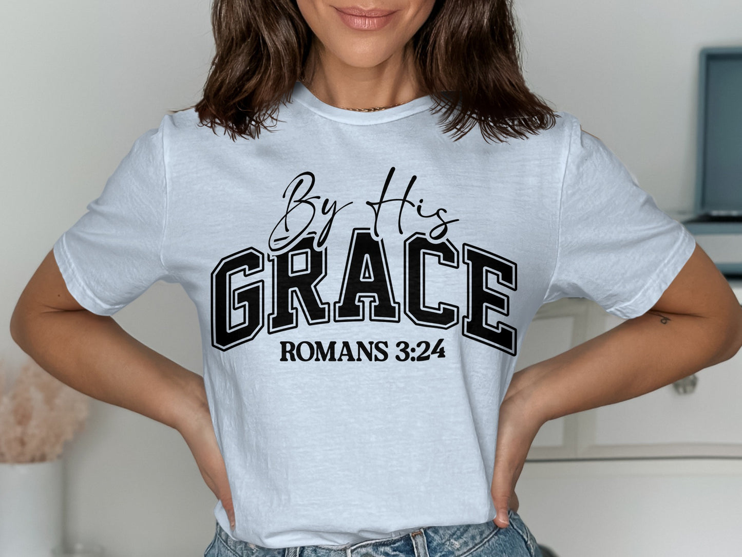 By His Grace Romans 3:24 Graphic Tee product type