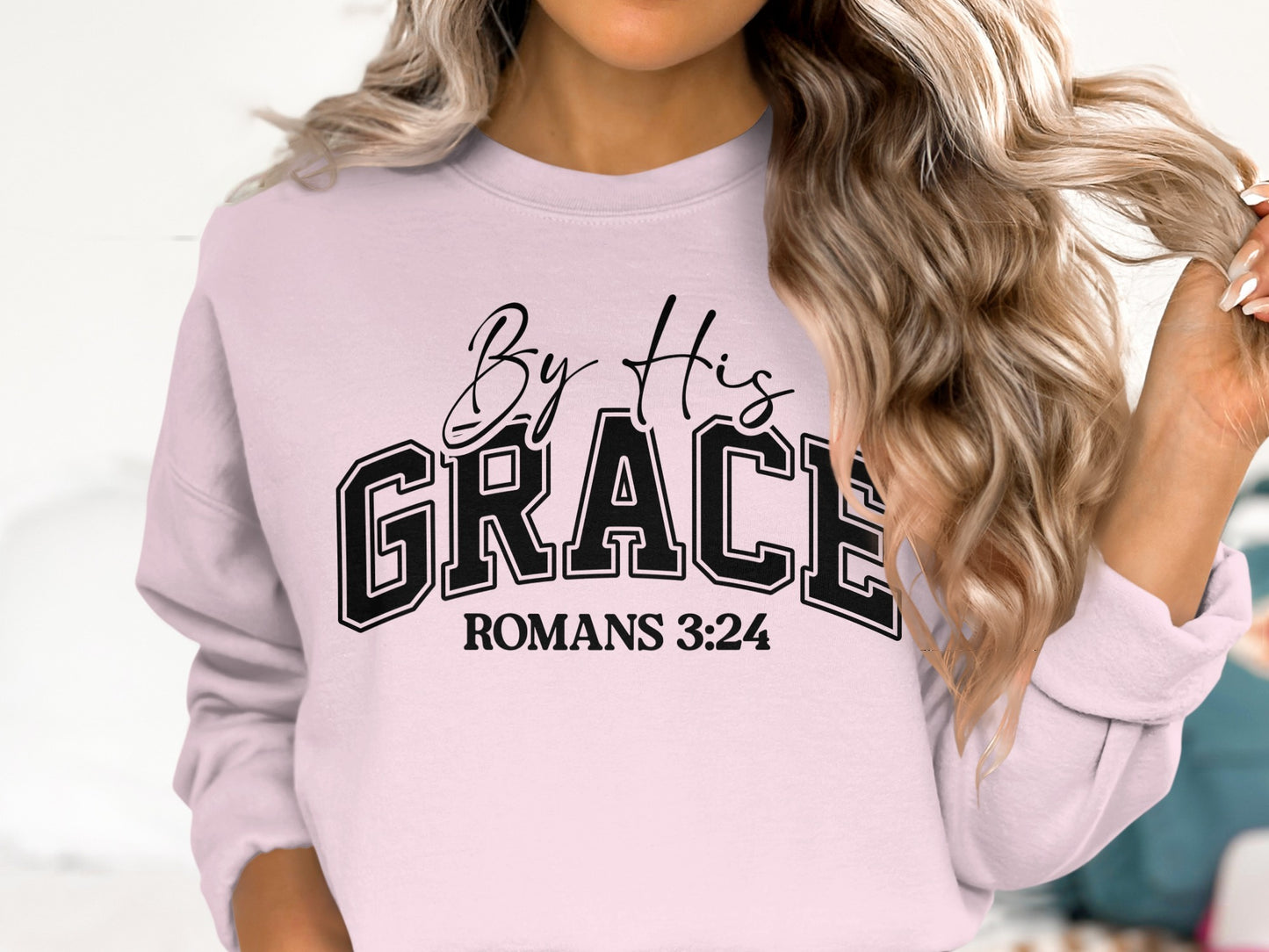 By His Grace Romans 3:24 Text on Sweater product